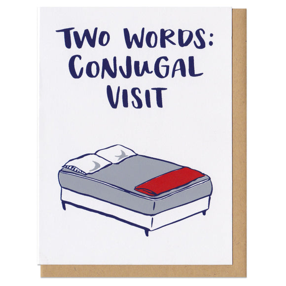 white greeting card with an illustrated double bed benath navy text that reads 