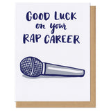 Greeting card and kraft paper envelope. Card reads in handwritten font, "good luck on your rap career." Illustration below of microphone.