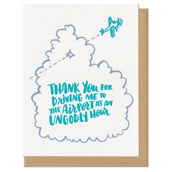 white greeting card with an illstration of an aeroplane flying through a cloud, teal hand-lettering on the cloud reads 