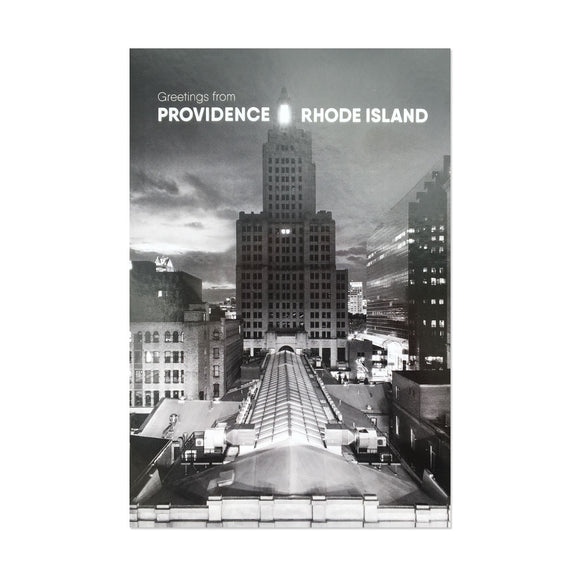 A postcard featuring a view of the industrial trust building in downtown Providence, Rhode Island in black and white.