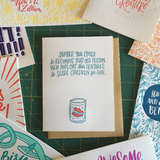 Blue, handwritten text centered at the top of the card that says "another year closer to becoming that old person who pops out their dentures to scare children for fun." A hand-drawn illustration of dentures in a glass of water below it.