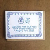 white greeting card with purple and blue illustrated border and a portrait of a short-haired woman. blue hand-lettering in the middle of the card reads "mom fact #92 alligators make their nests out of rotting vegatation - a natural heat source"