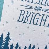 close up detail of the star pattern, some trees, and some hand-lettering
