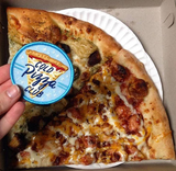 A blue patch that says, "cold pizza club" against a slice of pizza being held above two slices of pizza.