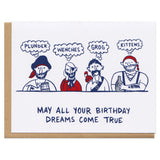 Horizontal greeting card and kraft paper envelope. Illustration of four pirates sitting next to each other, with thought bubbles that read, "Plunder." "Wenches." "Grog." "Kittens." Text below reads, "May all your birthday dreams come true"
