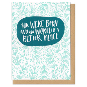 greeting card with a teal floral pattern which reads "you were born and the world is a better place"