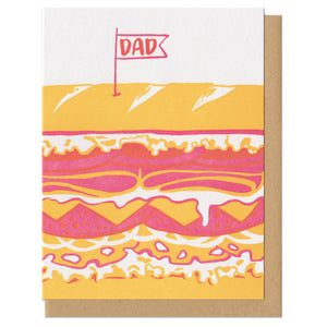 Greeting card with kraft paper envelope. Illustration of giant sandwich. Flag on toothpick on top that reads, "dad"