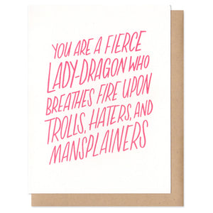 white greeting card with red text which reads "you are a fierce lady-dragon who breathes fire upon trolls, hater, and mansplainers"