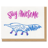 white greeting card with an illustrated ant-eater on rollerskates beneath hand-lettering that reads "stay awesome"