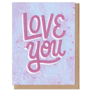 A greeting card with an envelope. Purple script reading "love you" on a lilac textured background. romance, love, greeting card, cards