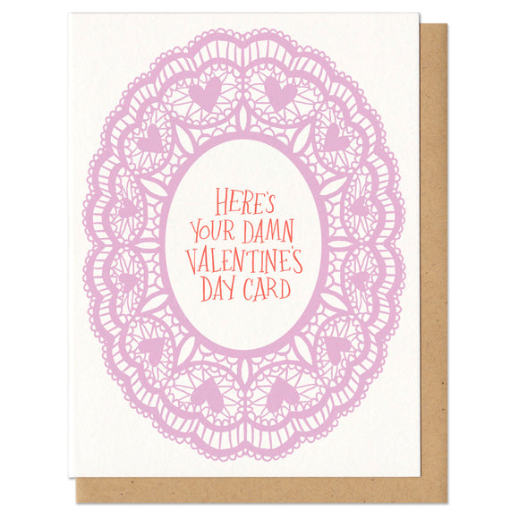 Greeting card and kraft paper envelope. Illustration of pink, lacey doily. At the center the handwritten text reads, 