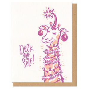 A greeting card and envelope featuring a sassy pink and peach giraffe who is decked out in garland, tinsel, lights, and balls on their ears. The text next to them reads "deck yo self!" greeting card, ornaments, holiday, holidays, christmas, decorations, card