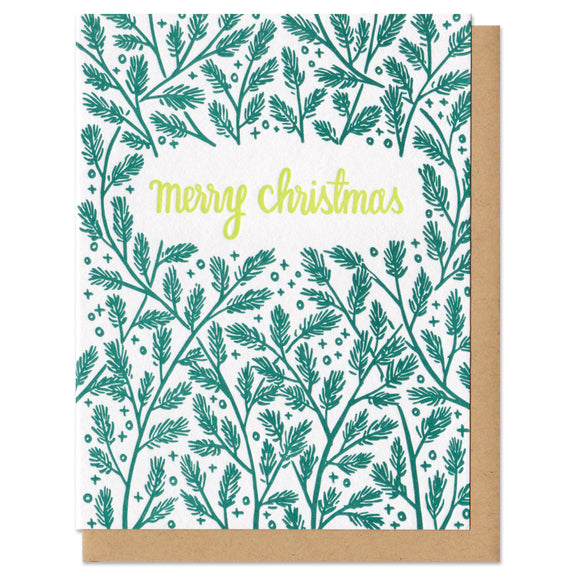 white greeting card with a darkgreen pine boughs pattern surrounding lime green hand-lettering that reads 