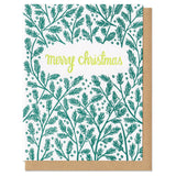 white greeting card with a darkgreen pine boughs pattern surrounding lime green hand-lettering that reads "merry christmas"