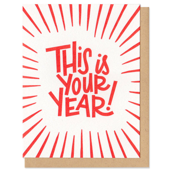white greeting card with red lines and hand-lettering that reads 
