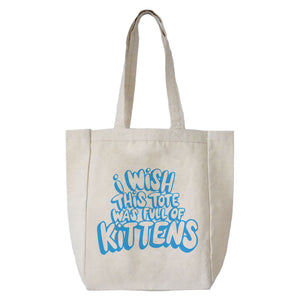 A cotton tote with handle screen printed in blue bubble letters that read "I wish this tote was full of kittens."