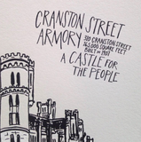 A 5" x 7" art print of the Cranston Street Armory in Providence RI. Text reads, "310 Cranston Street 165,000 square feet built in 1907. A castle for the people." The building is hand drawn in black and white.