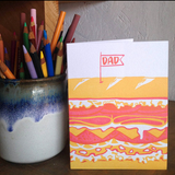 Greeting card with kraft paper envelope. Illustration of giant sandwich. Flag on toothpick on top that reads, "dad". Greeting  card, cards, stationery, father's dad, dad