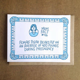 white greeting card with blue illustrated border and a portrait of a short-haired woman. blue hand-lettering in the middle of the card reads "mom fact #46, female polar bears put on an average of 400 pounds during pregnancy"