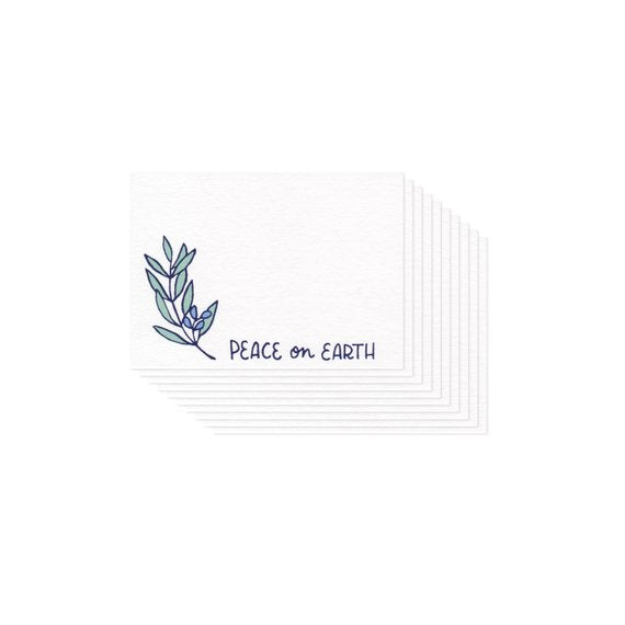 small white card featuring an illustration of a laurel branch and hand lettering that reads 